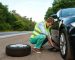 man repairing puncture tyre